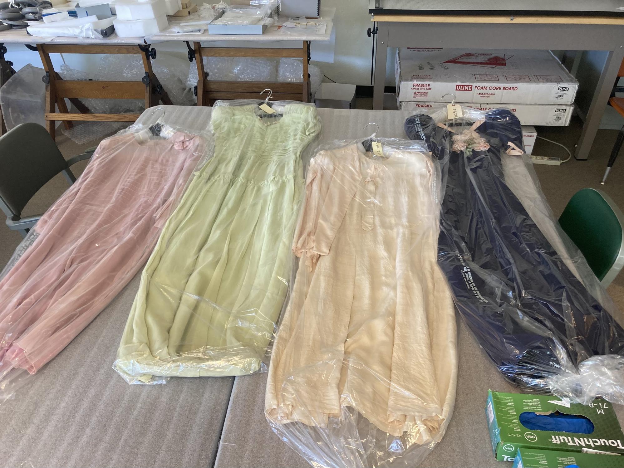 A Collection of Dresses from the 1920s-30s waiting to be inventoried and photographed