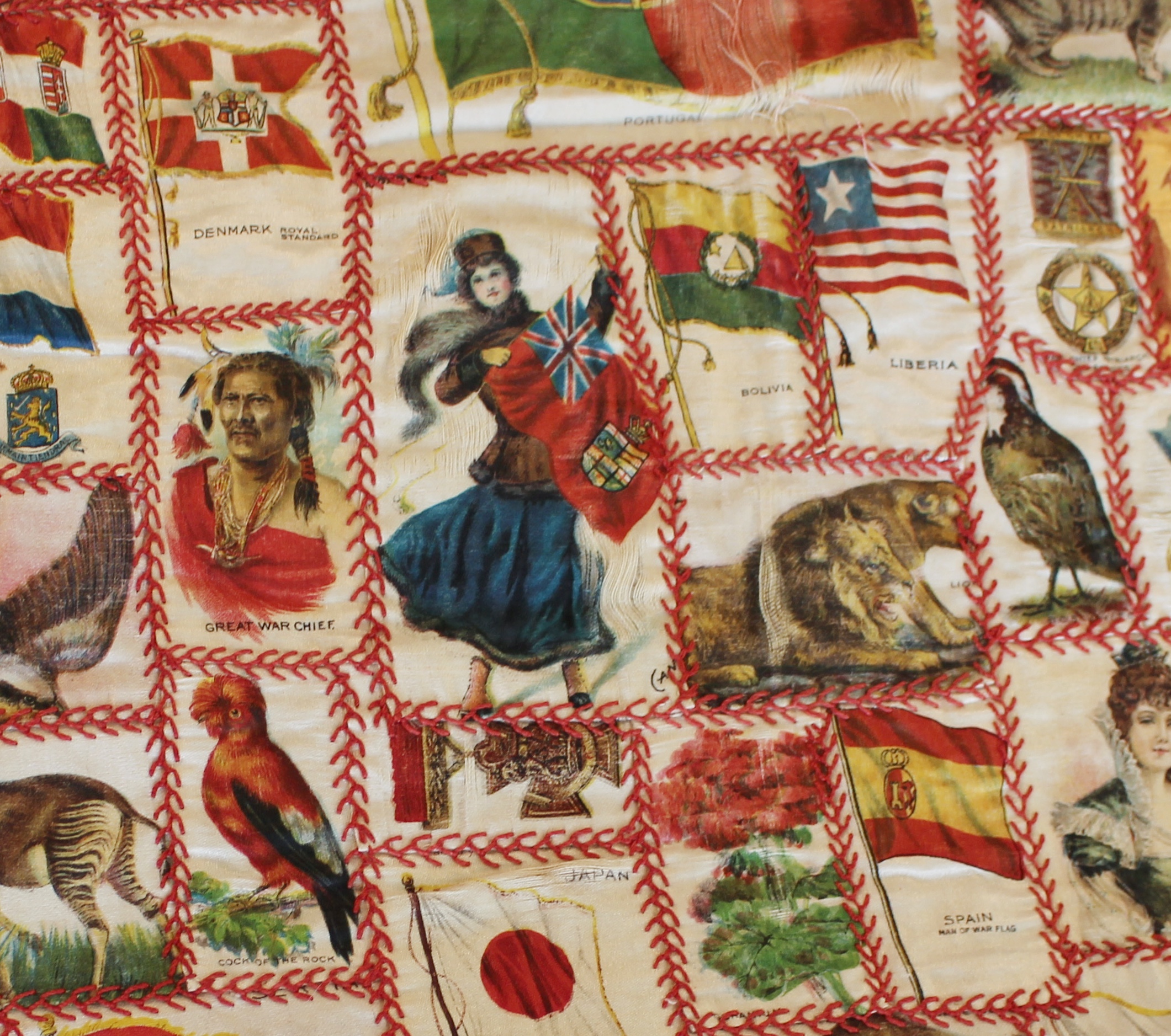 close up of section of quilt featuring woman with Canadian flag