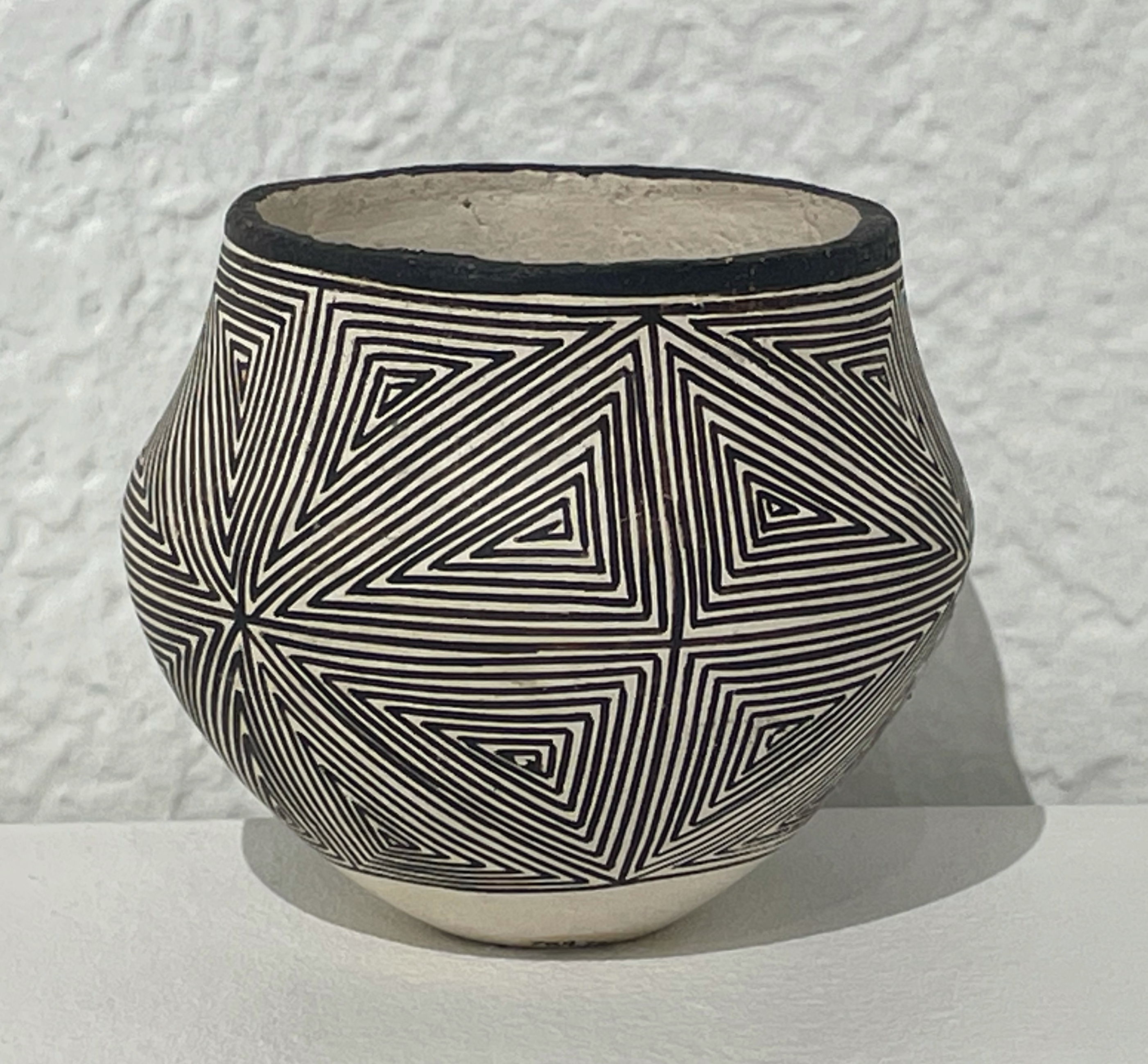 Small bowl with black and white linear designs by Lucy Lewis