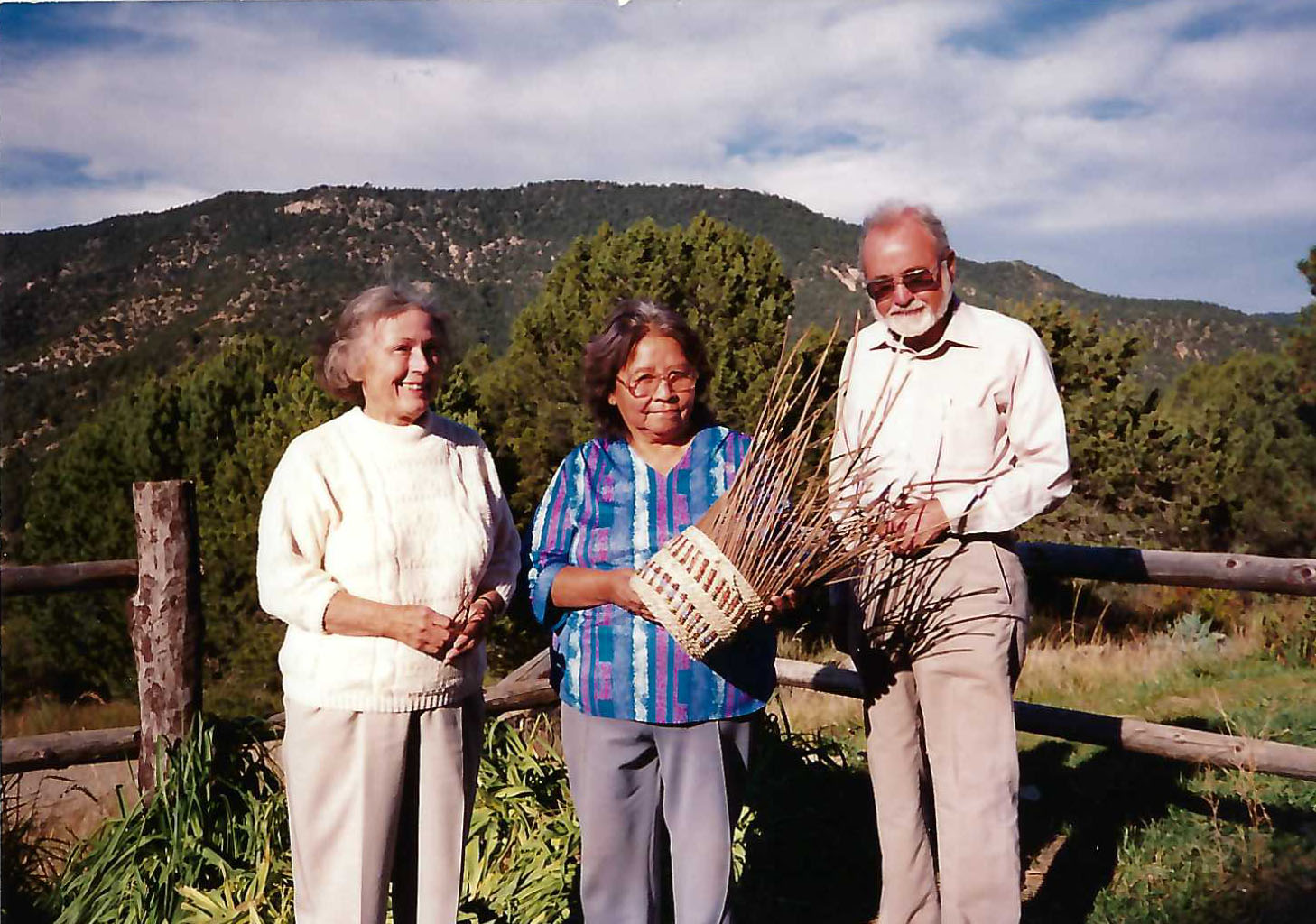 Charles and Mildred Miles with Lydia Pesata (center) holding basket.