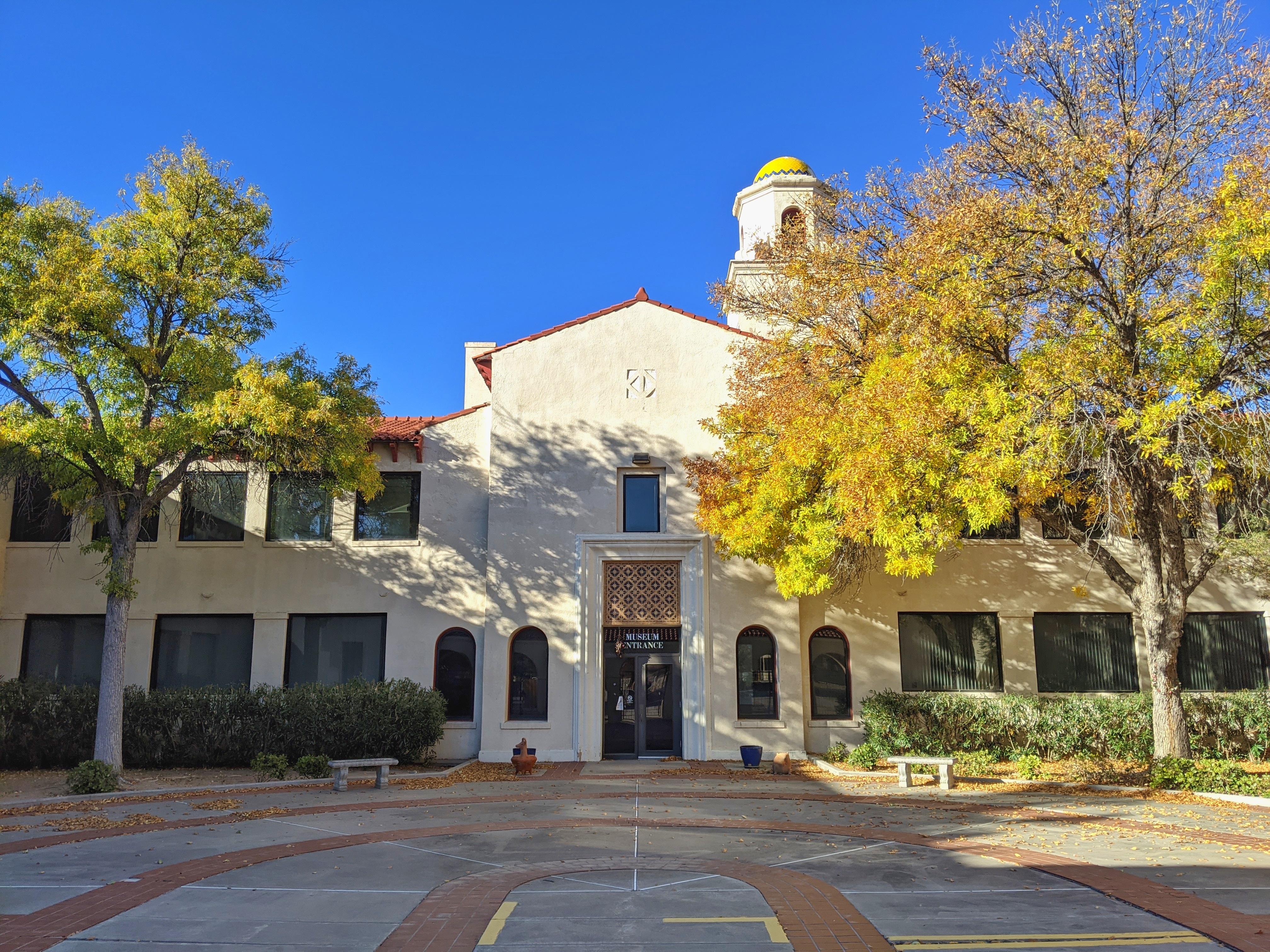 Exterior of University Museum building Kent Hall in Fall