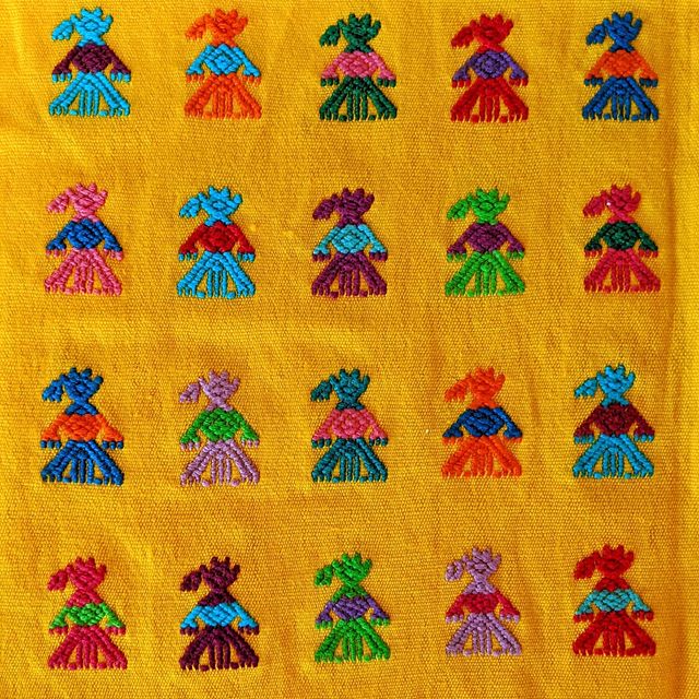 Chiapas Yellow Textile with Woman Symbols going across