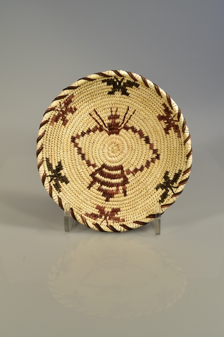 Woven basket with bees